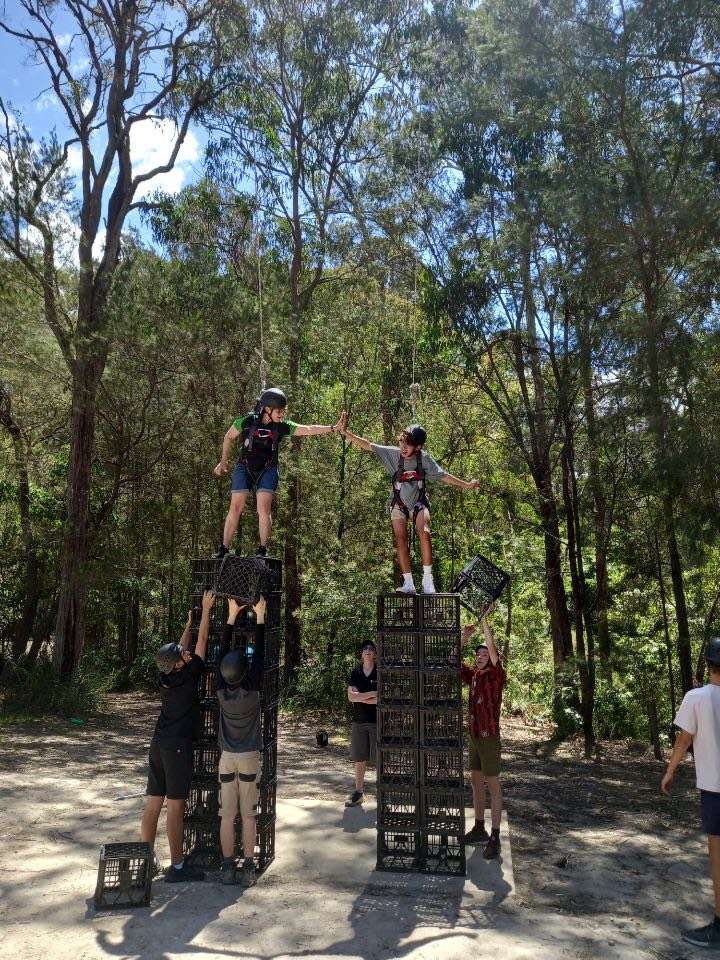 High fives all round atop the crate towers at Kianinny